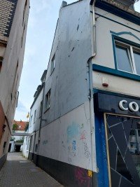 Bild (a51348a3816322bd9e1e16900d497af6): Hastedt - Mehrfamilienhaus mit Gewerbe als Kapitalanlage!